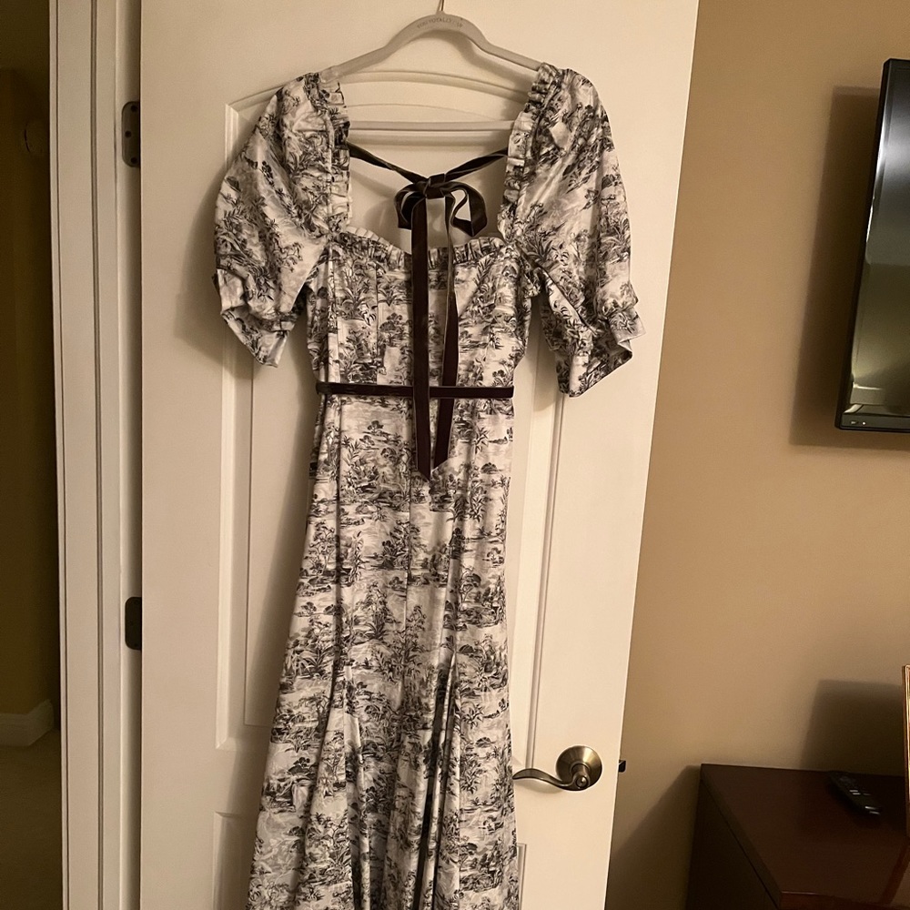 I wore this for 4 hours! Brand new beautiful feminine dress